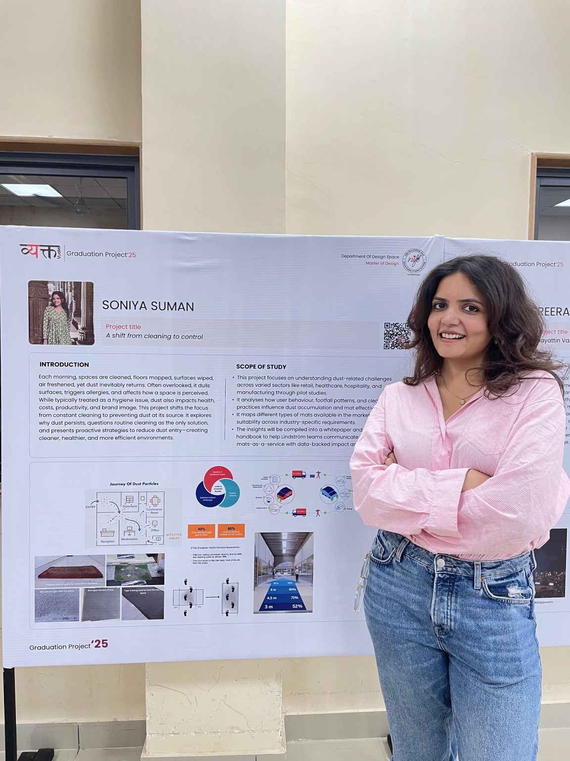Soniya Suman standing beside her graduation project board