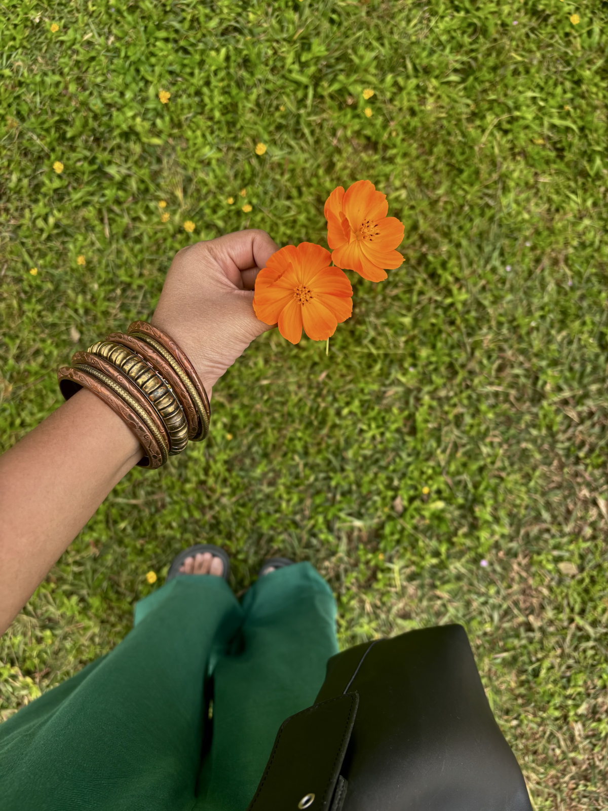 Soniya Suman holding orange flowers